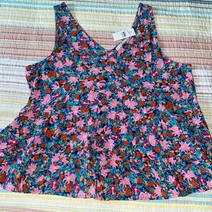 NWT, Loft double V, sleeveless peplum blouse in pink floral design. Size large.